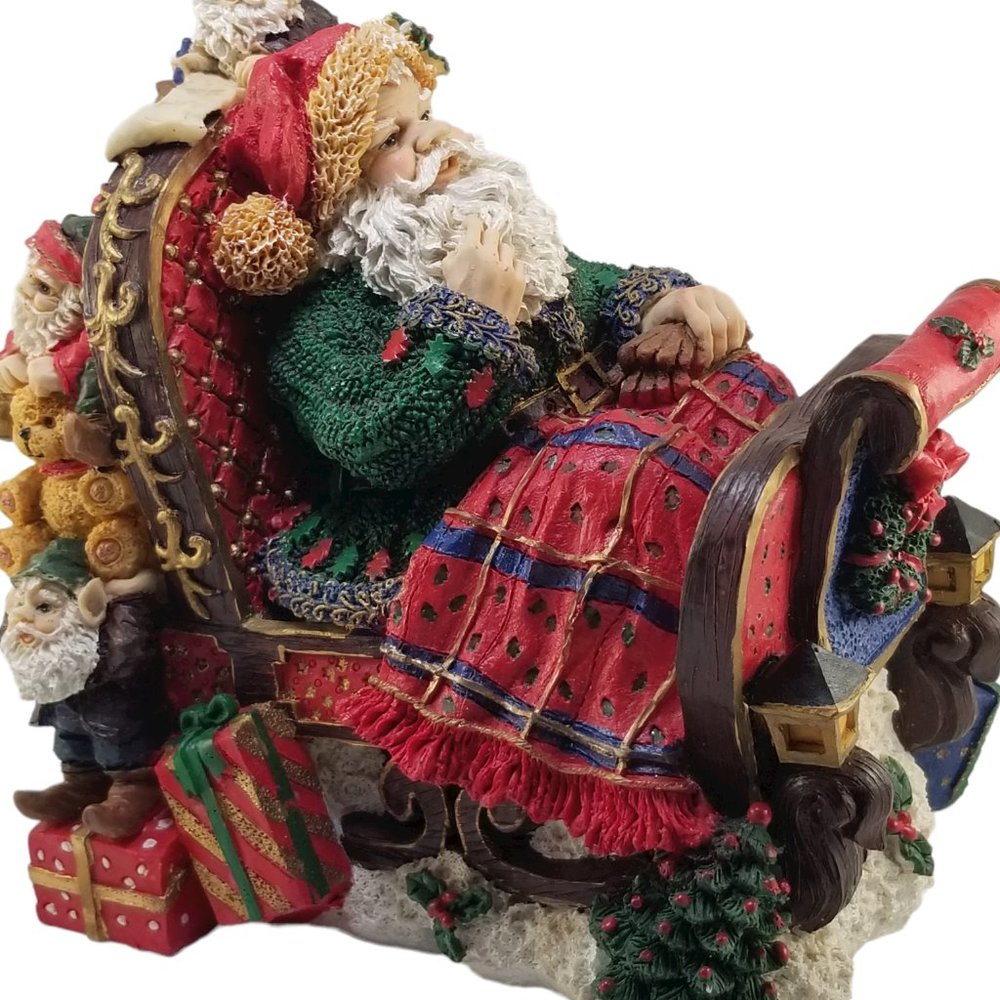 Santa in a Red Sleight Bed Resin Holiday Décor with Elves, Presents, And Toys - Picture 2 of 15